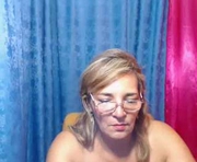 hairymature69 is a 52 year old female webcam sex model.