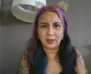 theglasskitty is a 46 year old female webcam sex model.