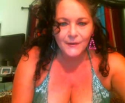 nayaleigh2269 is a 55 year old female webcam sex model.