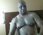 oldblkcam7 is a 54 year old male webcam sex model.