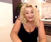 bon_aventura is a 50 year old female webcam sex model.