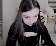 evelles is a 23 year old female webcam sex model.