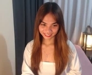 asian_reyshell is a  year old shemale webcam sex model.