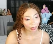 mav_21 is a 18 year old female webcam sex model.
