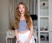 light_kitty is a 18 year old female webcam sex model.