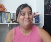 madfeather is a  year old female webcam sex model.