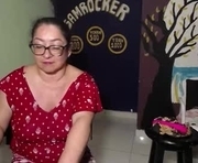 samrocker_sex is a 45 year old female webcam sex model.