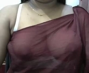 sruti23 is a 18 year old female webcam sex model.