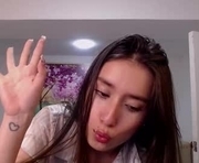 adhara_kitten is a 21 year old female webcam sex model.