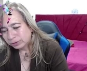 sccarlet_rose22 is a 50 year old female webcam sex model.