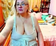 ellyhot53 is a 55 year old female webcam sex model.