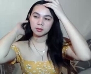 asian_rhyxx is a  year old female webcam sex model.