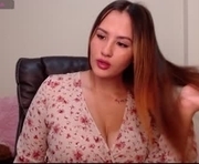 scarlettbrowmn is a 21 year old female webcam sex model.