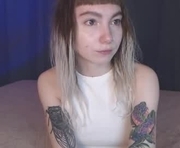 tattoo_art_baby is a 19 year old female webcam sex model.