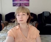 tattease is a 47 year old female webcam sex model.