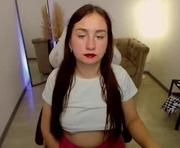 esther_bright is a 19 year old female webcam sex model.