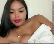 sweetie_zaima is a  year old female webcam sex model.