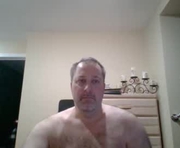 brettsky is a 48 year old male webcam sex model.