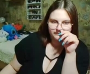 whisperinthedarkk is a  year old female webcam sex model.