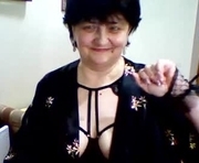 isxloves is a 51 year old female webcam sex model.