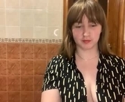 maroonmoon_ is a 25 year old female webcam sex model.