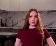 kyonggo is a 18 year old female webcam sex model.