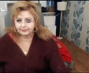 marthabrownn is a 56 year old female webcam sex model.