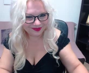 sonyamilf is a 50 year old female webcam sex model.