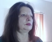 extasymature is a 54 year old female webcam sex model.