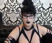queenofsin is a 52 year old female webcam sex model.
