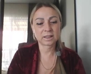 blondkitti is a 50 year old female webcam sex model.