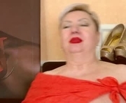 posh_lady is a 60 year old female webcam sex model.