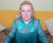 katysako is a 55 year old female webcam sex model.