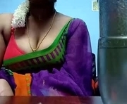 tamilmadhi520 is a 34 year old female webcam sex model.