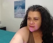 lucia1975_ is a 51 year old female webcam sex model.