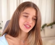 little_poetry is a 18 year old female webcam sex model.