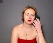 amazing_strip is a 41 year old female webcam sex model.