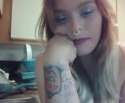 veiledsiren is a  year old female webcam sex model.