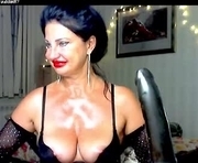 hornymommy69_ is a 47 year old female webcam sex model.