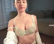 honeyco57 is a  year old female webcam sex model.