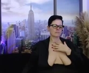 mollysun is a 51 year old female webcam sex model.