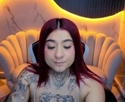 pink_tattoo_b is a 26 year old female webcam sex model.