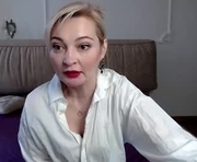 tinamil is a 38 year old female webcam sex model.