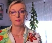 xvanessalove is a 50 year old female webcam sex model.