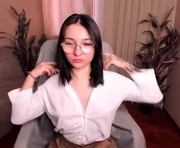 koralinaxo is a 18 year old female webcam sex model.