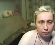 olguscha is a 48 year old female webcam sex model.