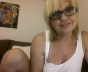 amberdoll4u is a 57 year old female webcam sex model.