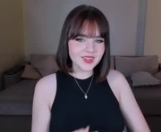 notjustagirll is a 18 year old female webcam sex model.