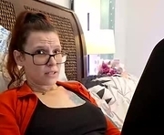 livingwithlilith is a 33 year old female webcam sex model.