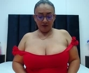 scarlet_ray_ is a 42 year old female webcam sex model.